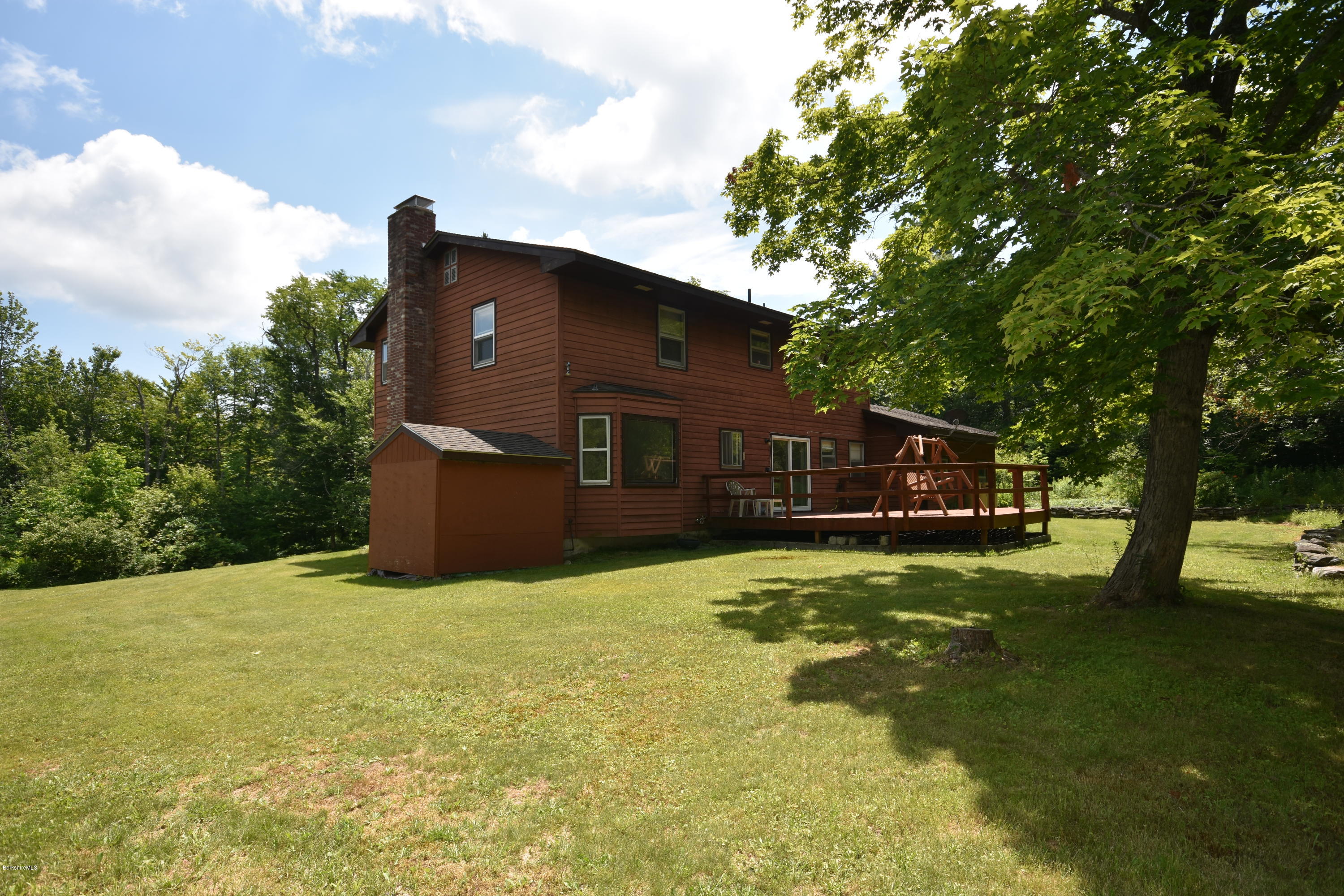 247 East Windsor Road Peru, MA 01235 - Photo 37 of 42 a front view of a house with a yard