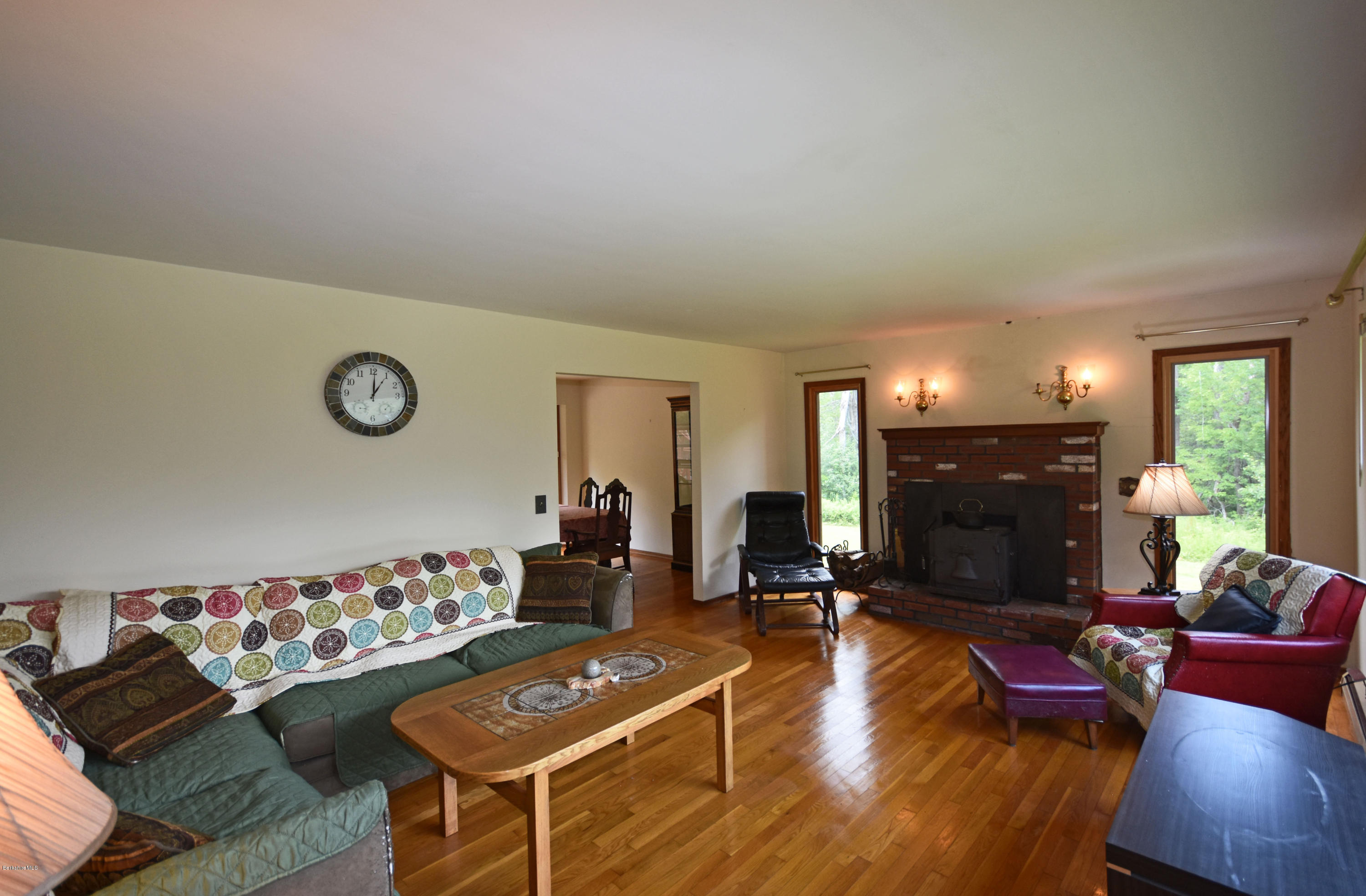 247 East Windsor Road Peru, MA 01235 - Photo 5 of 42 a living room with furniture and fireplace