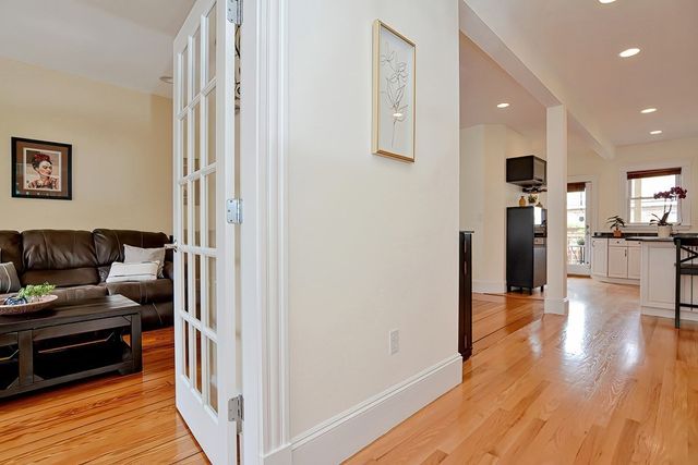 a view of a hardwood floor and workspace