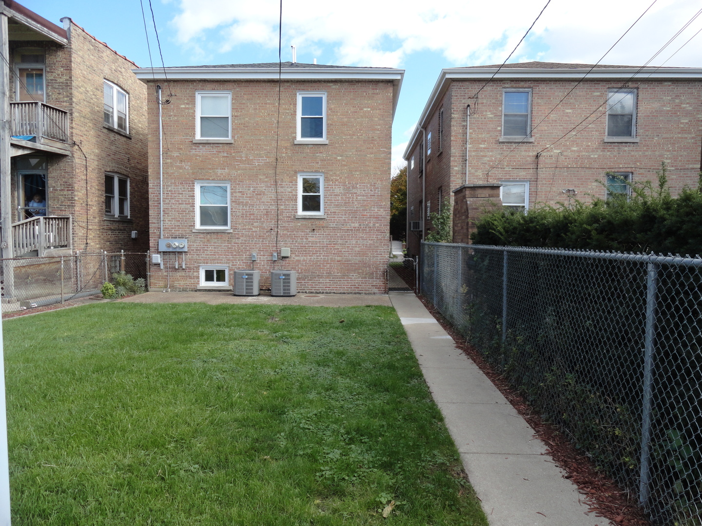 1410 Maple Avenue, Unit 1 Berwyn, IL 60402 - Photo 12 of 15 a front view of a house with garden