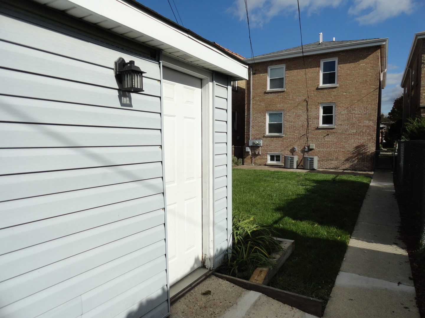 1410 Maple Avenue, Unit 1 Berwyn, IL 60402 - Photo 14 of 15 a view of backyard with seating space