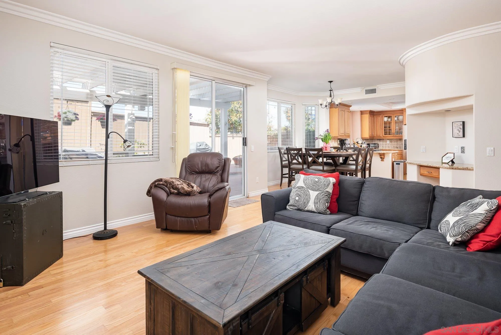 657 Cantara Lane Vista, CA 92081 - Photo 19 of 61 a living room with furniture and a large window