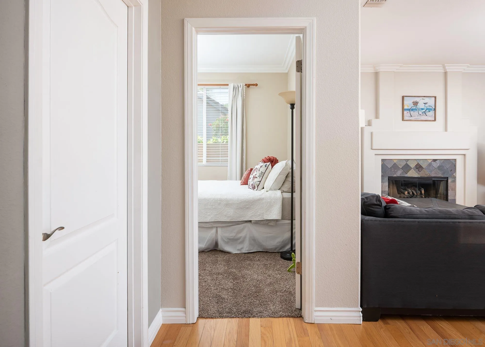 657 Cantara Lane Vista, CA 92081 - Photo 22 of 61 a en suite bathroom with a sink and a mirror
