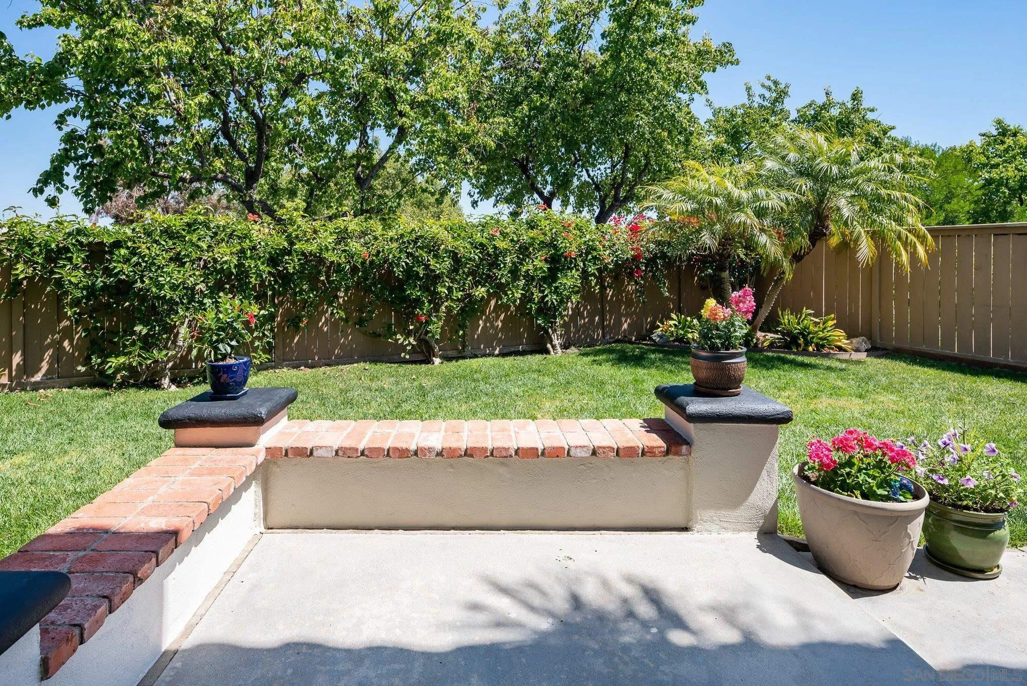657 Cantara Lane Vista, CA 92081 - Photo 52 of 61 a view of a garden with patio