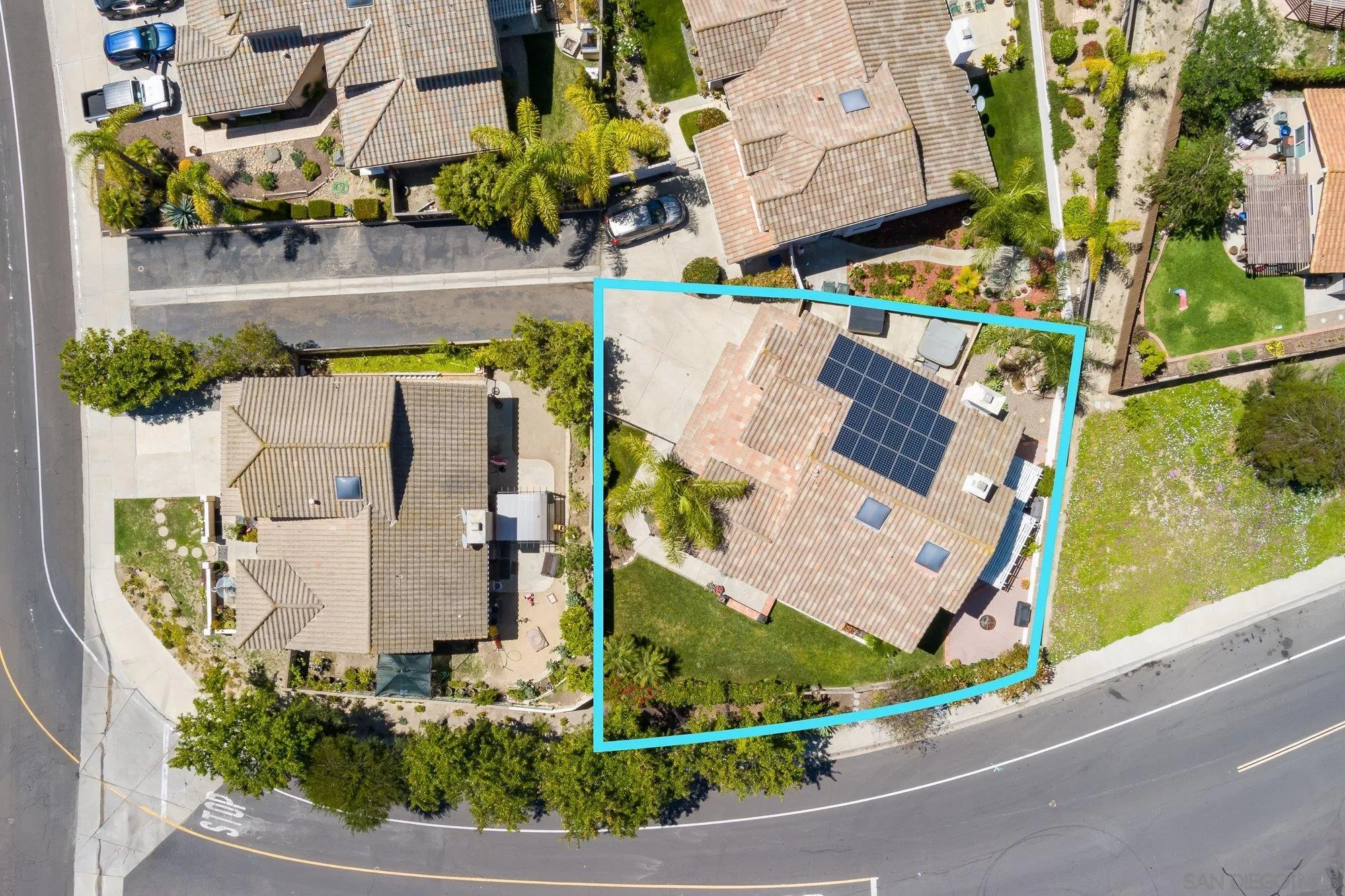 657 Cantara Lane Vista, CA 92081 - Photo 55 of 61 an aerial view of a house with a garden and a car parked