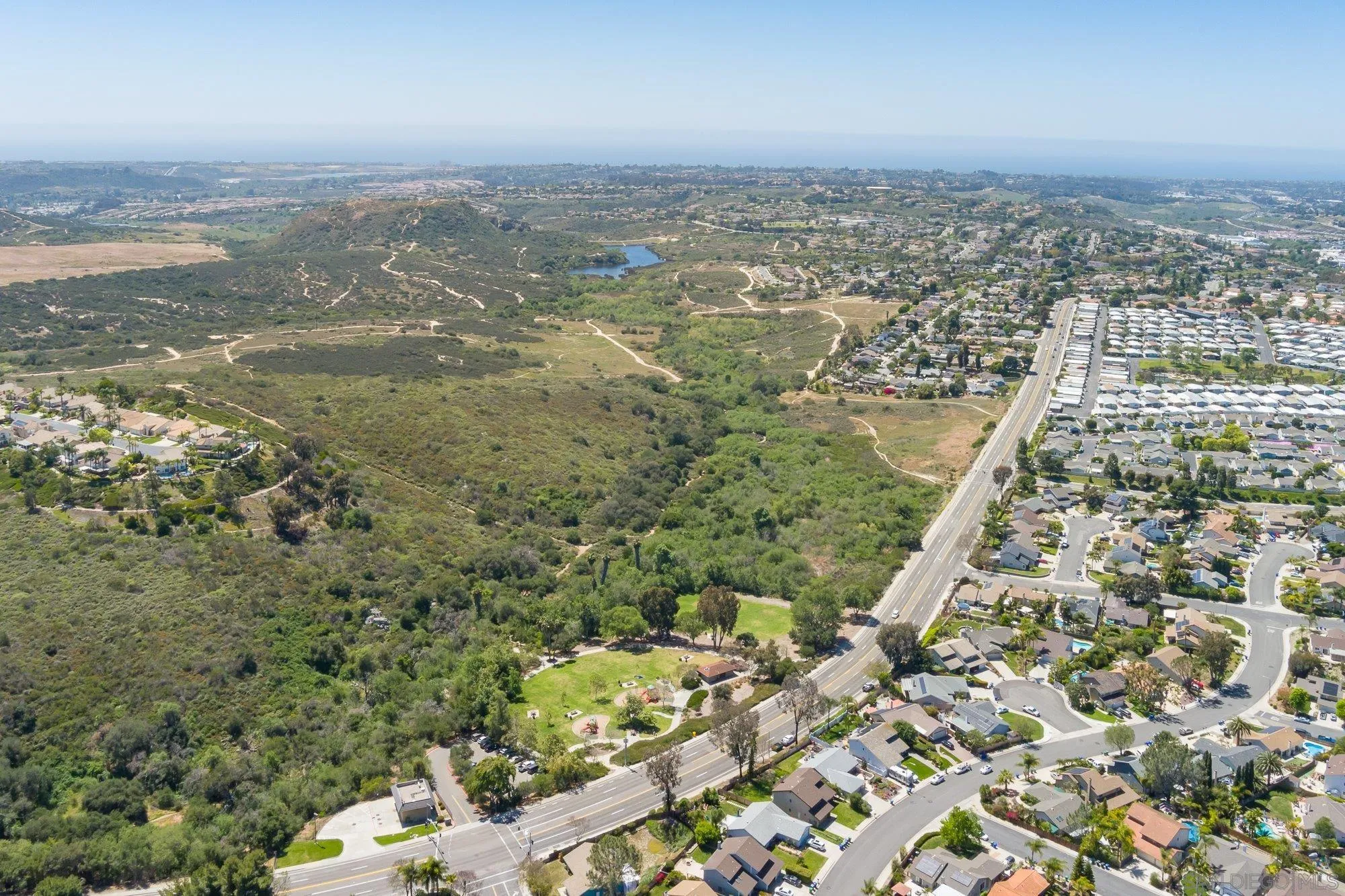 657 Cantara Lane Vista, CA 92081 - Photo 57 of 61 an aerial view of residential building and lake