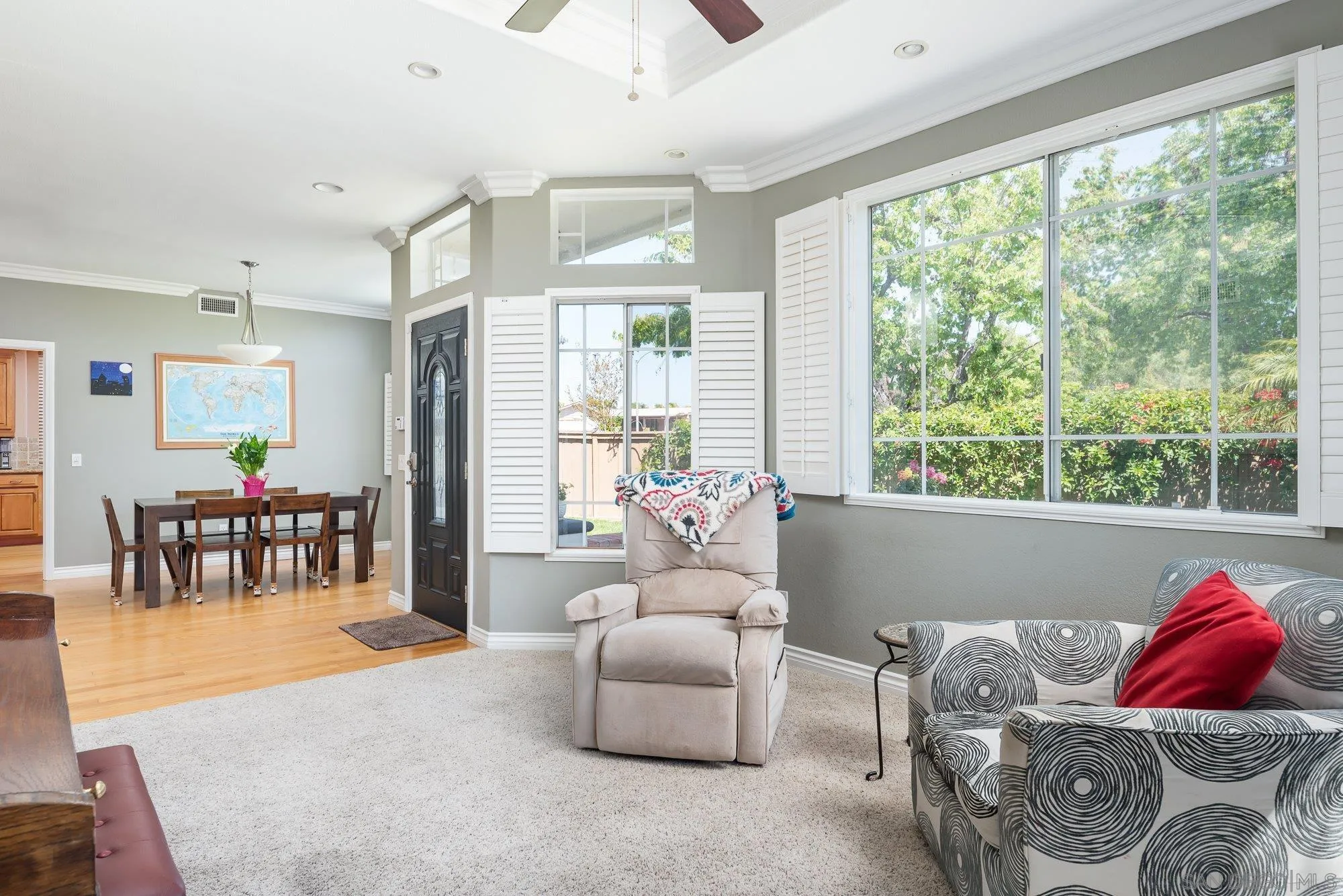 657 Cantara Lane Vista, CA 92081 - Photo 9 of 61 a living room with furniture and a large window