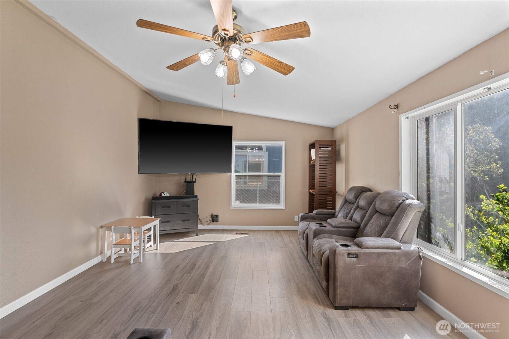 14934 Golden Delicious Street Entiat, WA 98822 - Photo 19 of 33 a living room with furniture and a large window