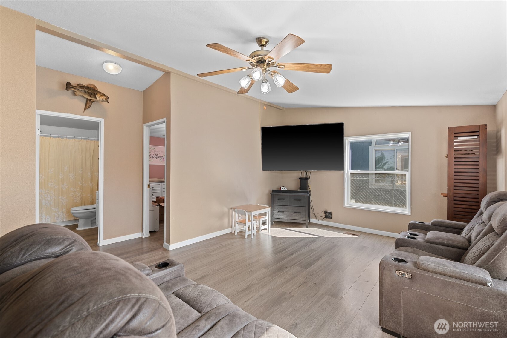 14934 Golden Delicious Street Entiat, WA 98822 - Photo 20 of 33 a living room with furniture a dining table and a window