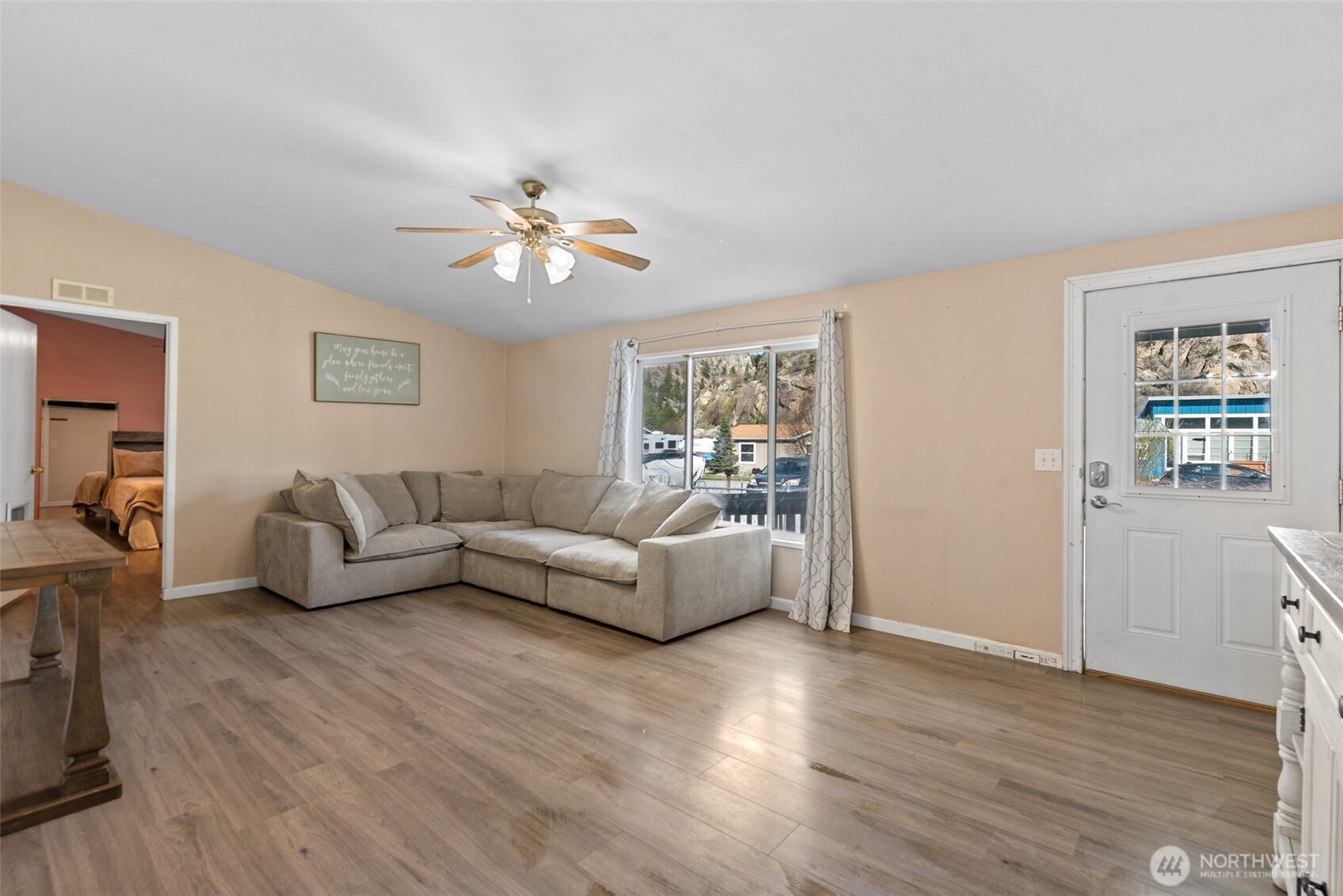 14934 Golden Delicious Street Entiat, WA 98822 - Photo 6 of 33 a living room with furniture and a wooden floor