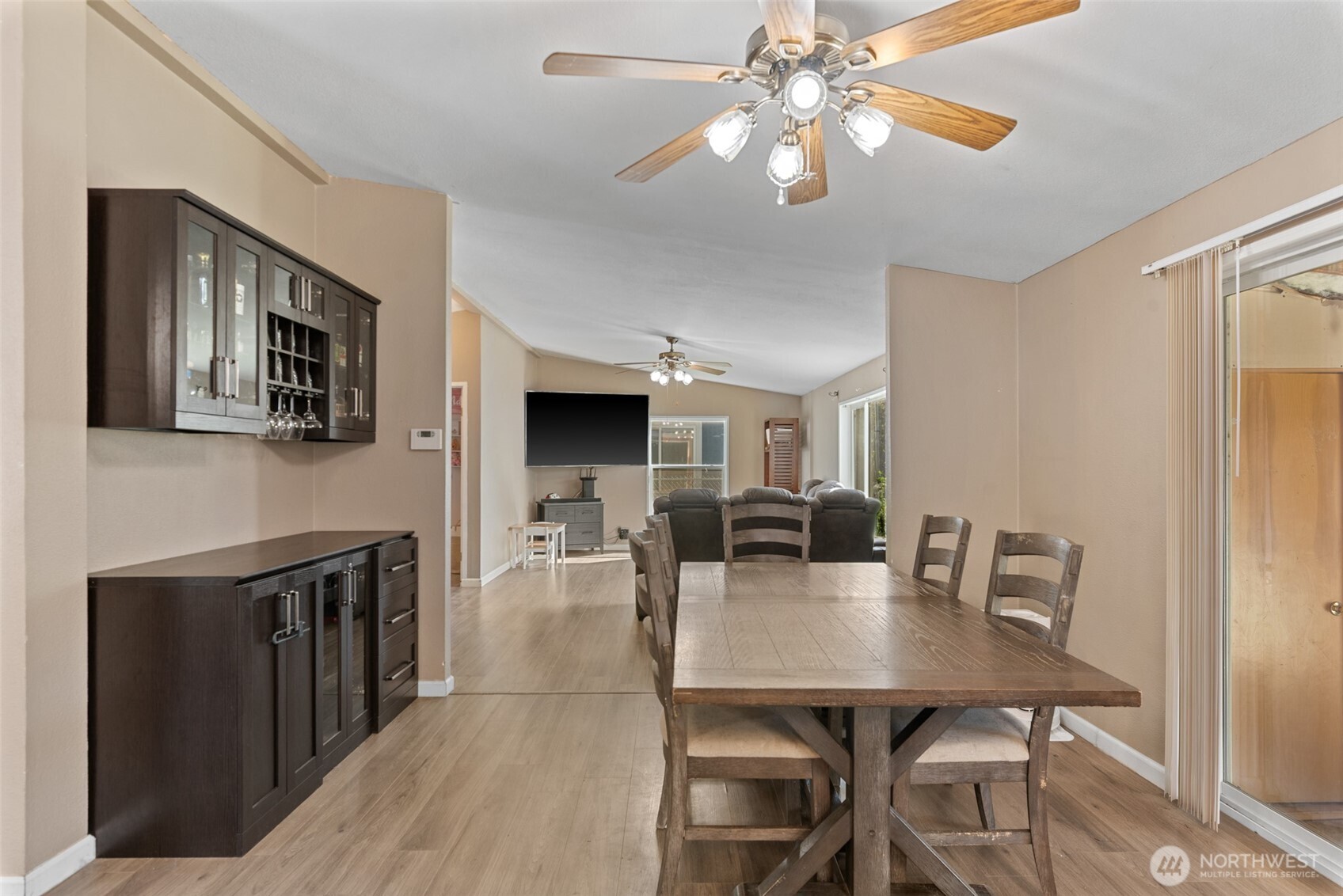 14934 Golden Delicious Street Entiat, WA 98822 - Photo 8 of 33 a view of a dining room with furniture and wooden floor