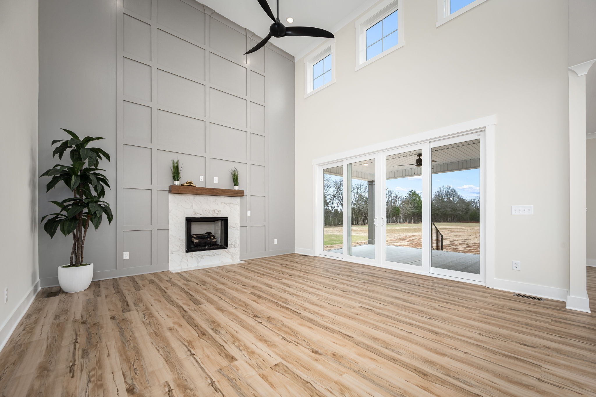 7302 West Gum Road Murfreesboro, TN 37127 - Photo 13 of 53 a view of a livingroom with a fireplace and window