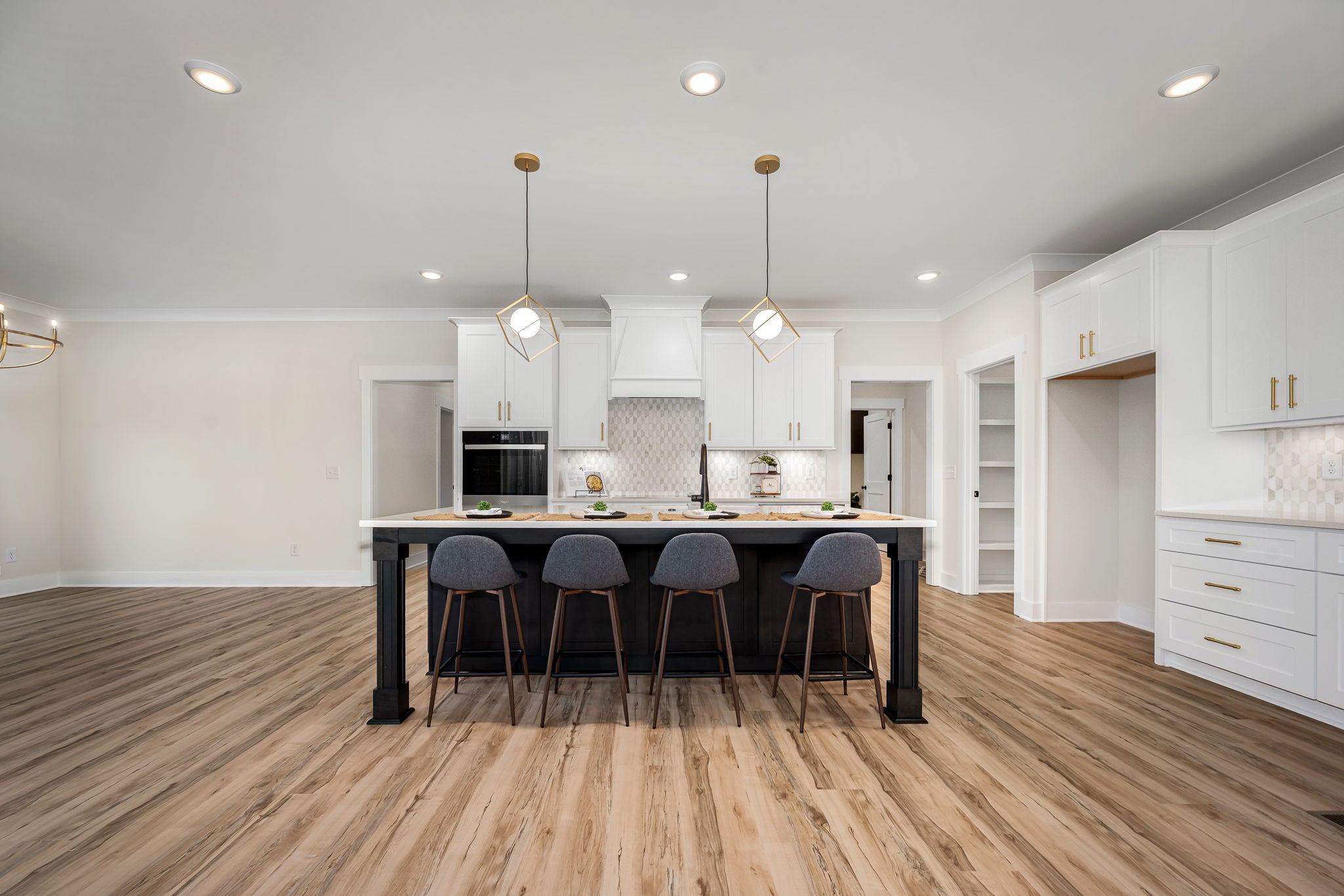 7302 West Gum Road Murfreesboro, TN 37127 - Photo 18 of 53 a large kitchen with a table and chairs