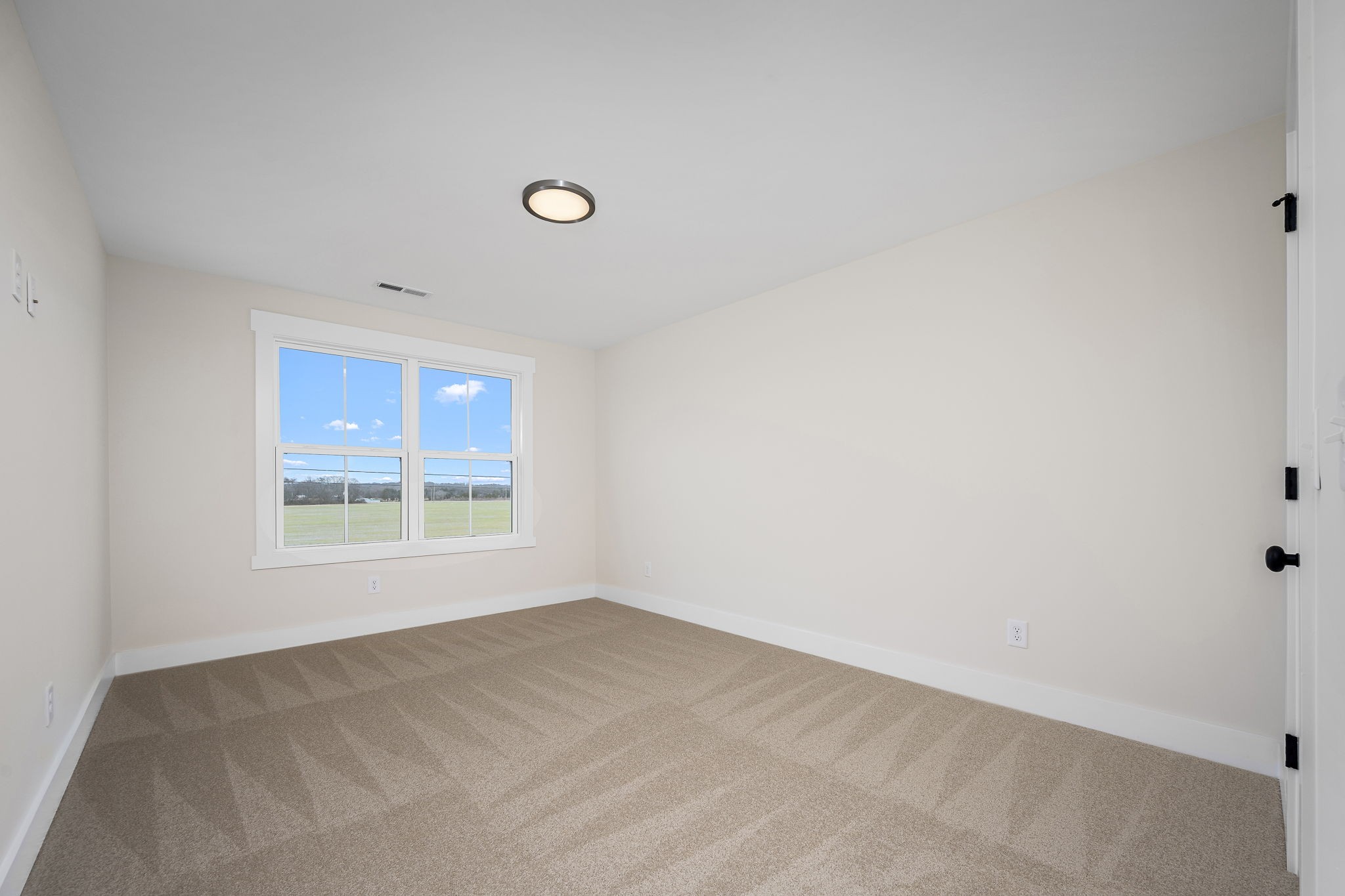 7302 West Gum Road Murfreesboro, TN 37127 - Photo 38 of 53 an empty room with a window