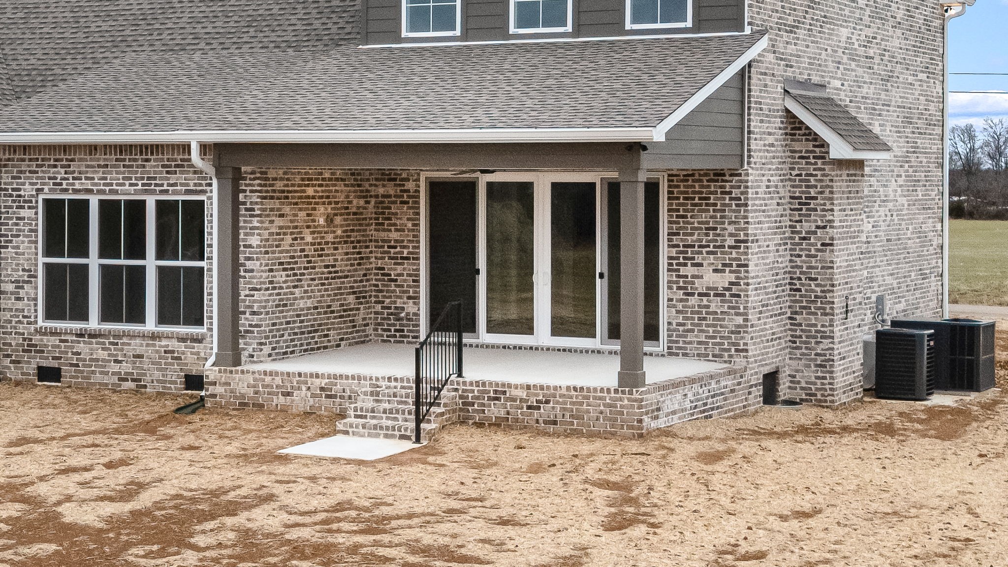 7302 West Gum Road Murfreesboro, TN 37127 - Photo 45 of 53 a front view of a house with a yard and garage