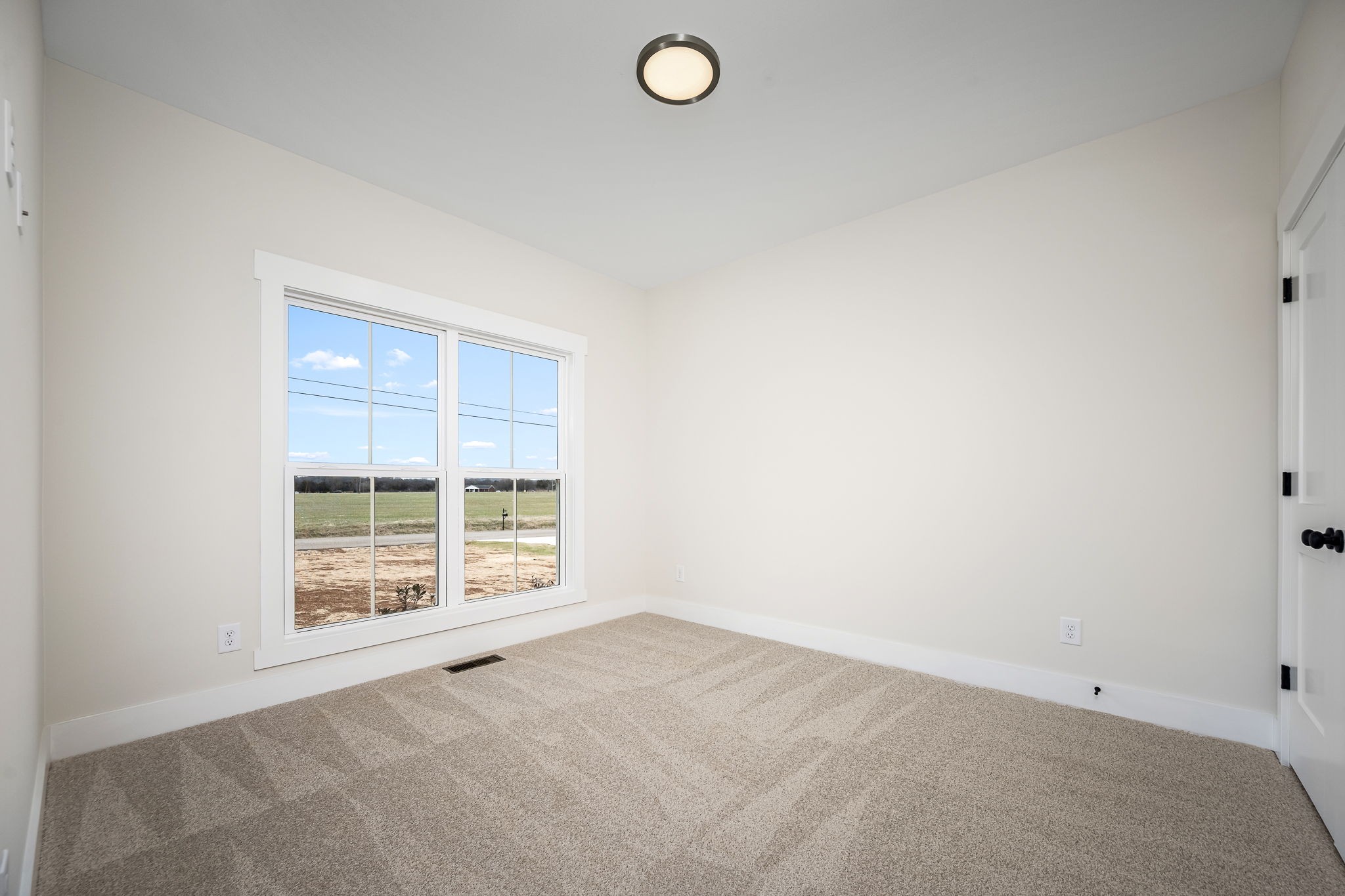 7302 West Gum Road Murfreesboro, TN 37127 - Photo 10 of 53 an empty room with windows