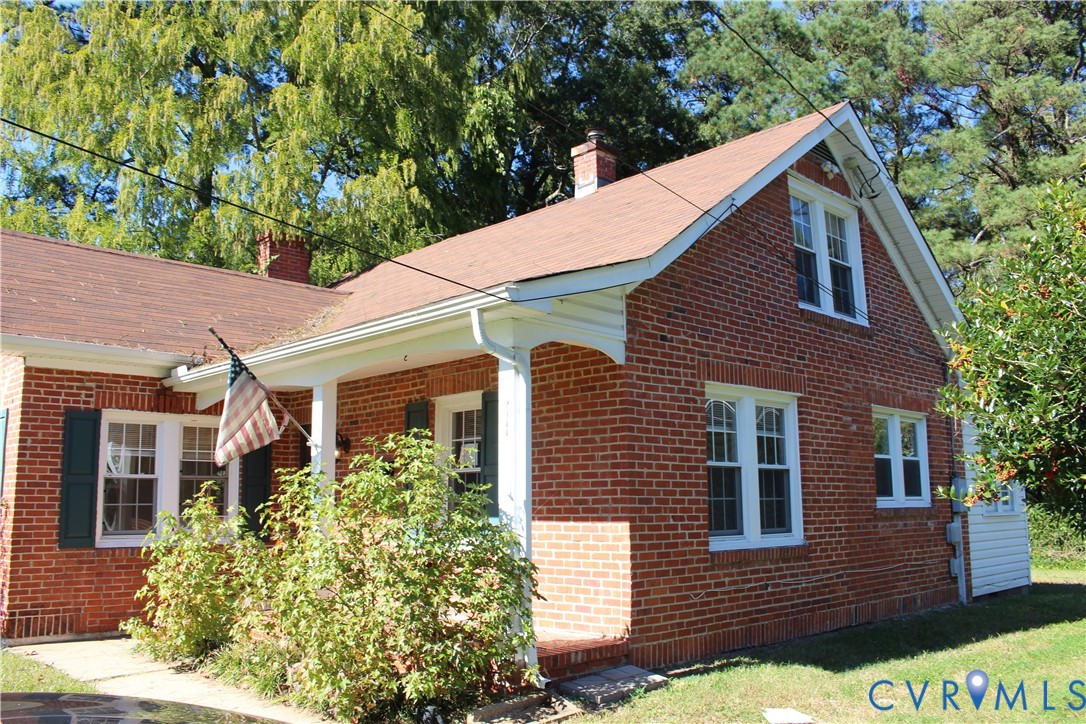 2411 West City Point Road Hopewell, VA 23860 - Photo 2 of 11 a view of a house with a yard