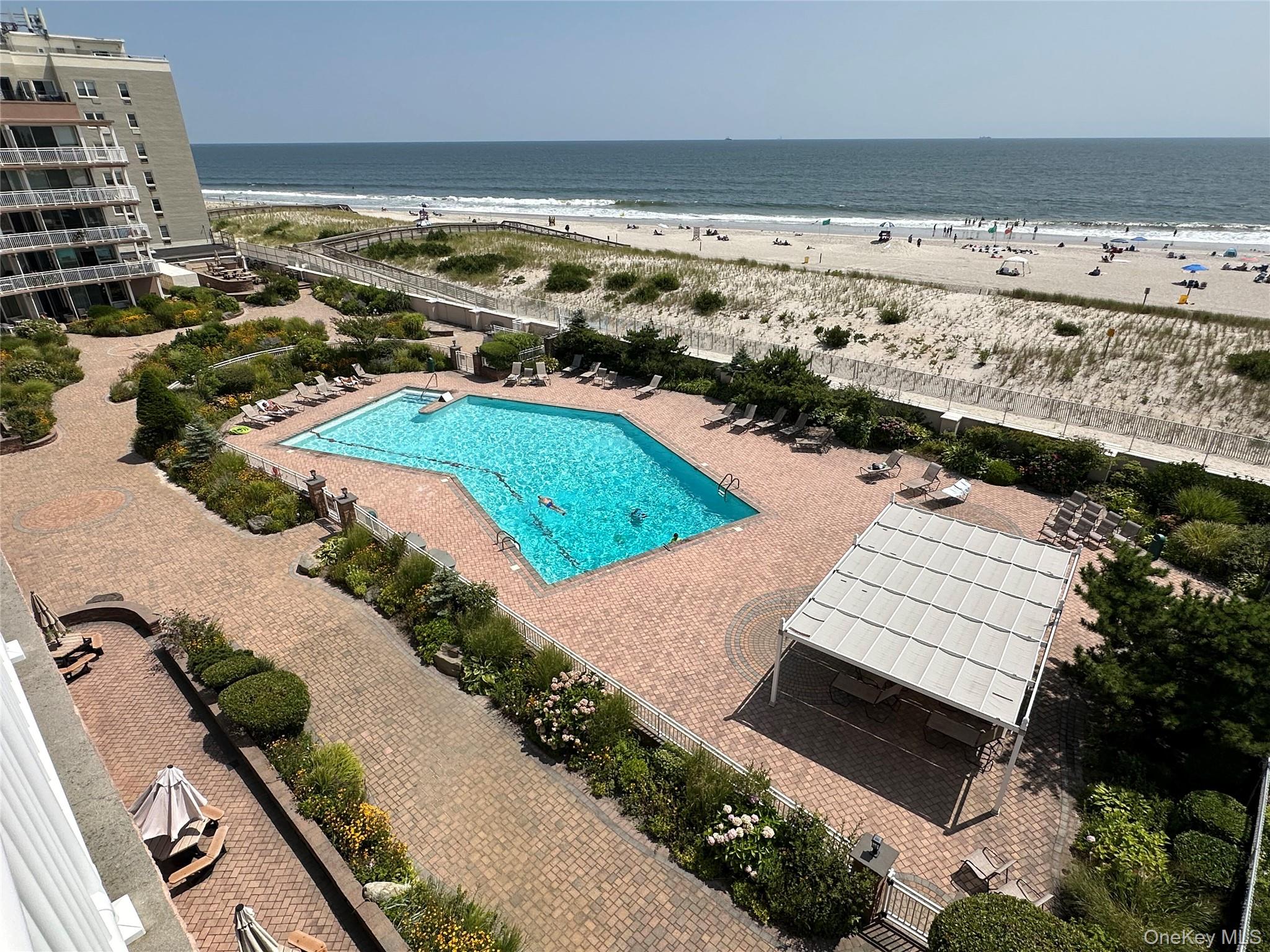 830 Shore Road, Unit 5T Long Beach, NY 11561 - Photo 12 of 18 a view of an ocean and beach