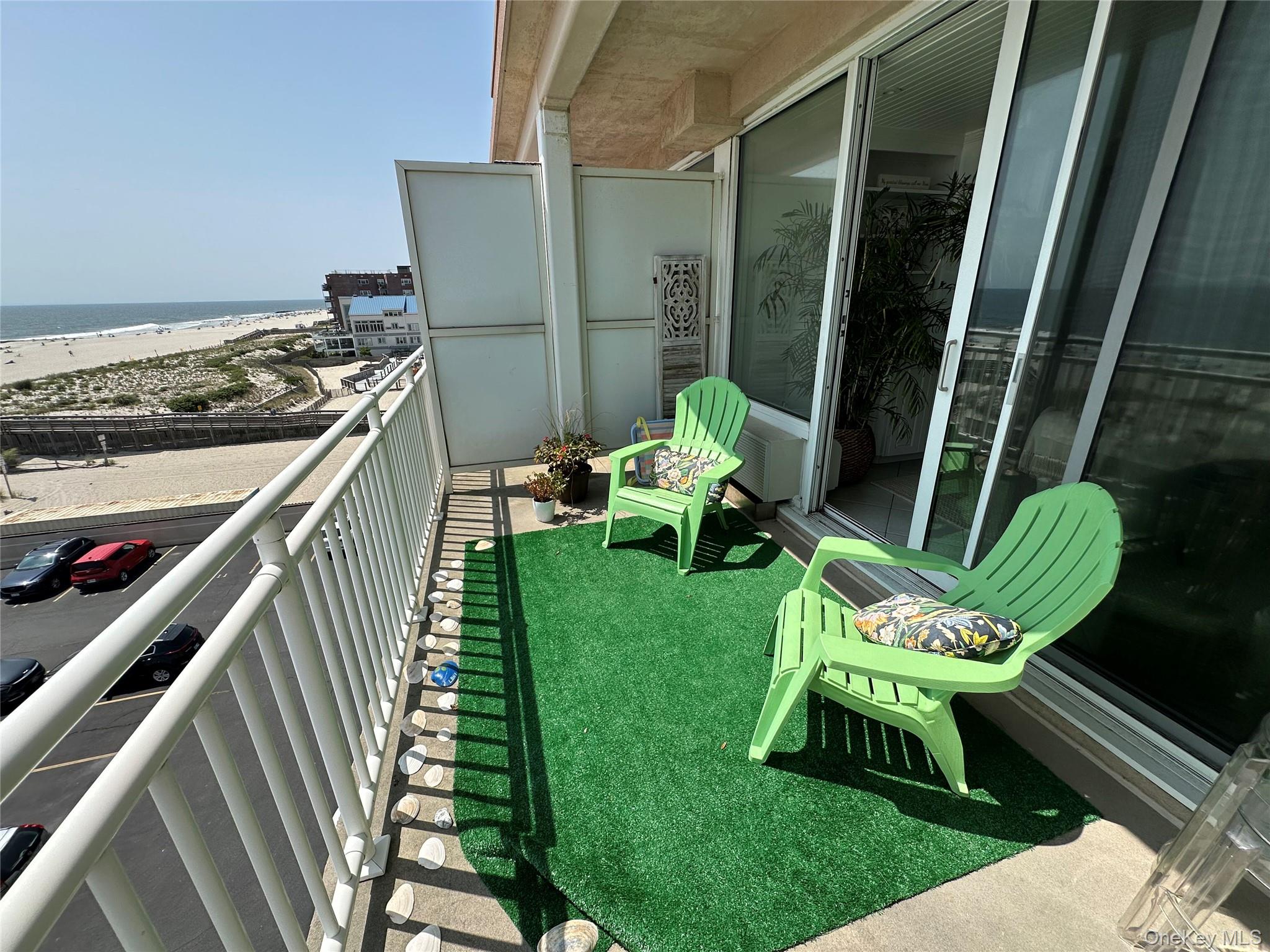 830 Shore Road, Unit 5T Long Beach, NY 11561 - Photo 14 of 18 a garden view with a seating space