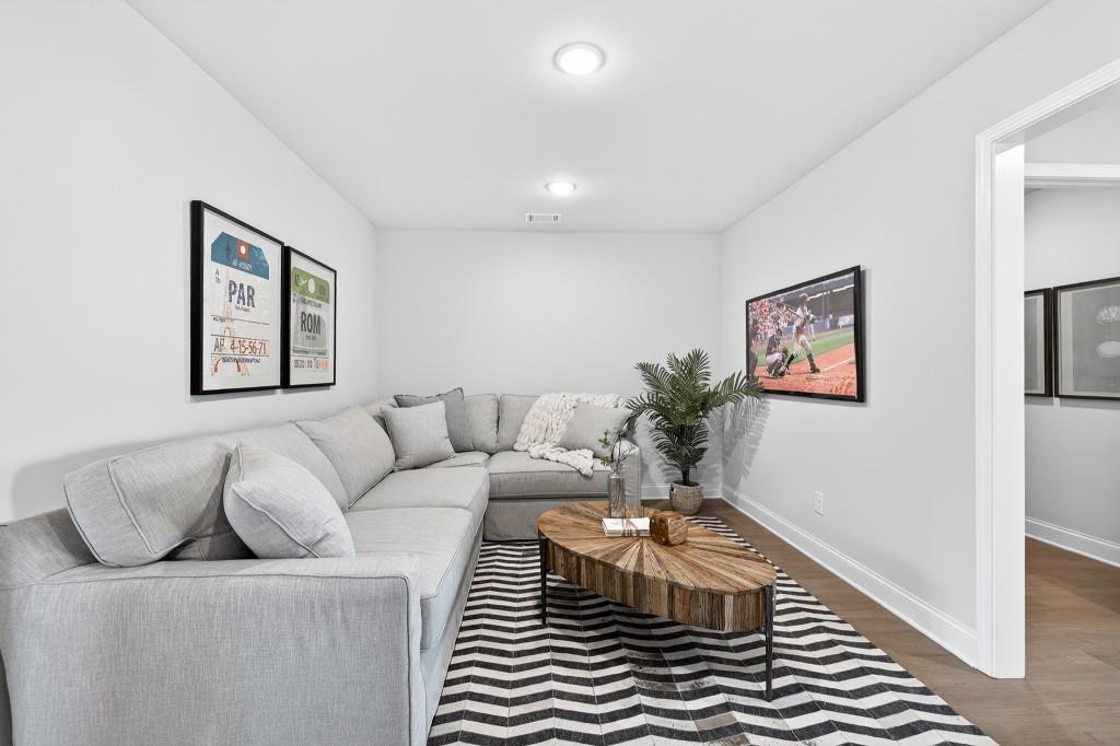 2789 Apperson Way Suwanee, GA 30024 - Photo 12 of 37 a living room with furniture and a window