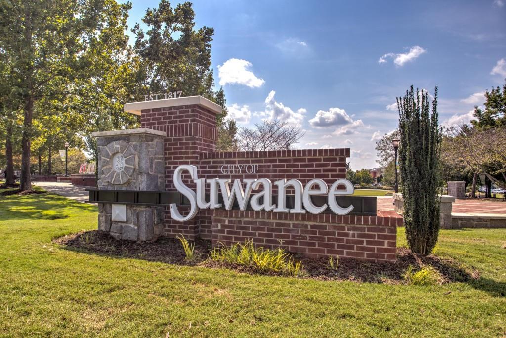 2789 Apperson Way Suwanee, GA 30024 - Photo 32 of 37 a sign on the side of a building