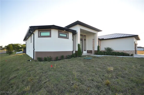 a view of backyard of house