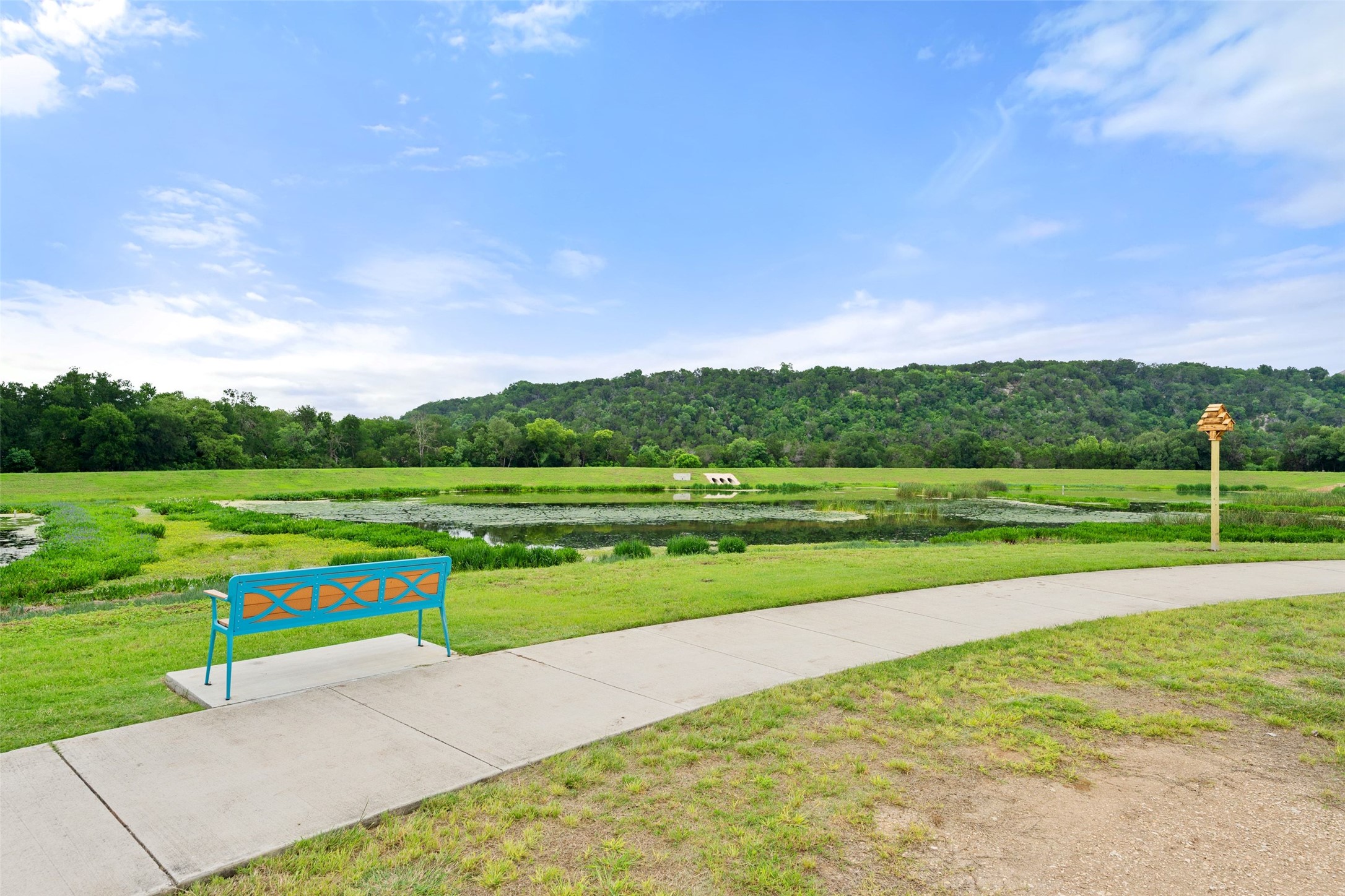 1513 Hinterwald Street Leander, TX 78641 - Photo 13 of 40 a view of a golf course with a play ground