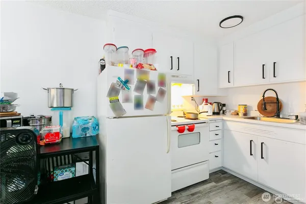 a bedroom with a bed and a table