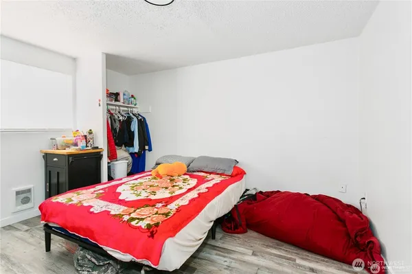 a kitchen with a table and chairs