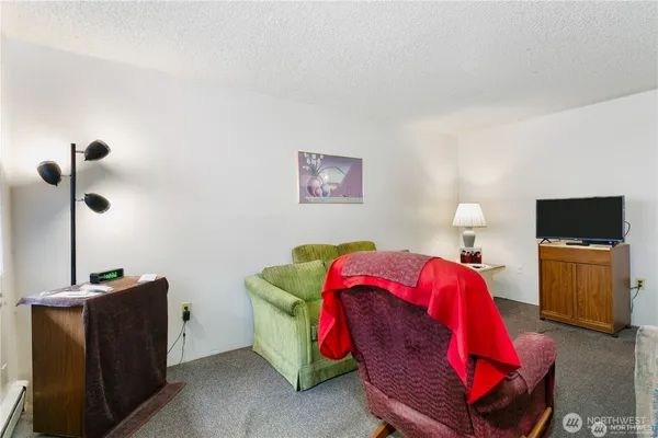a kitchen with stainless steel appliances a refrigerator sink and cabinets