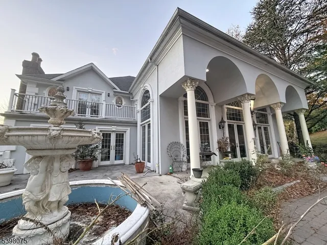 a front view of a house with entertaining space