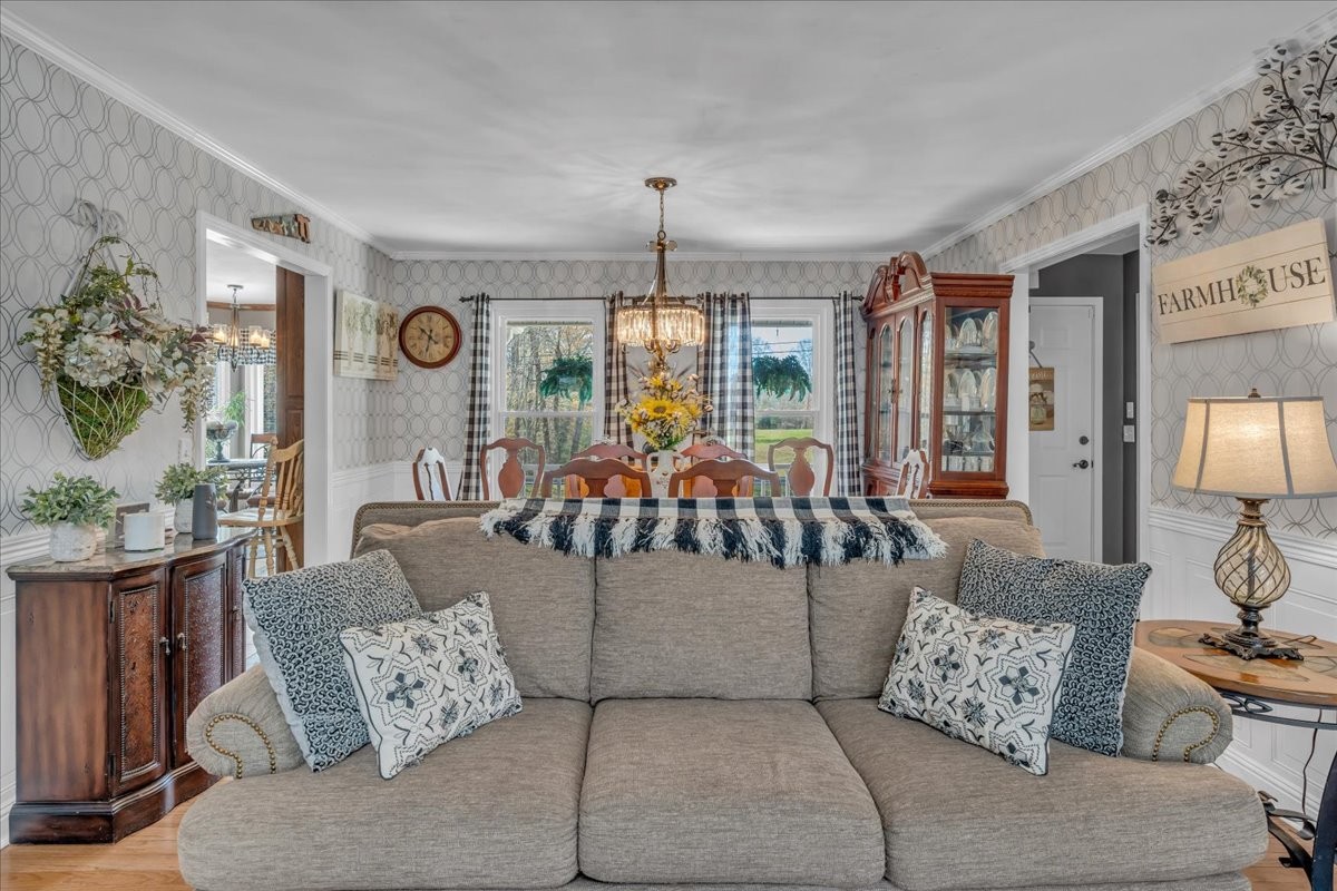 3404 Awalt Road Tullahoma, TN 37388 - Photo 16 of 84 a living room with furniture and a chandelier