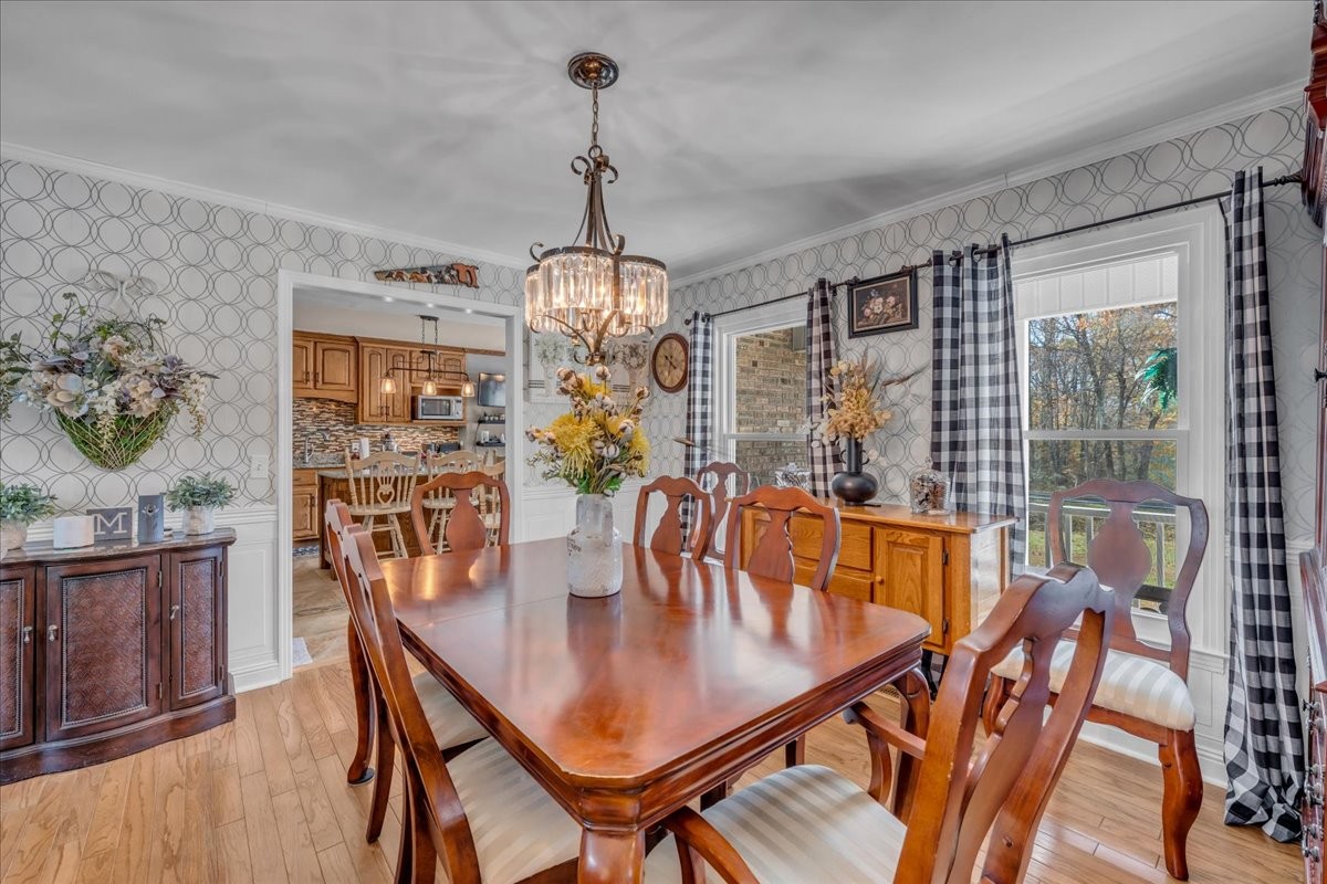 3404 Awalt Road Tullahoma, TN 37388 - Photo 18 of 84 a view of a dining room with furniture window and wooden floor
