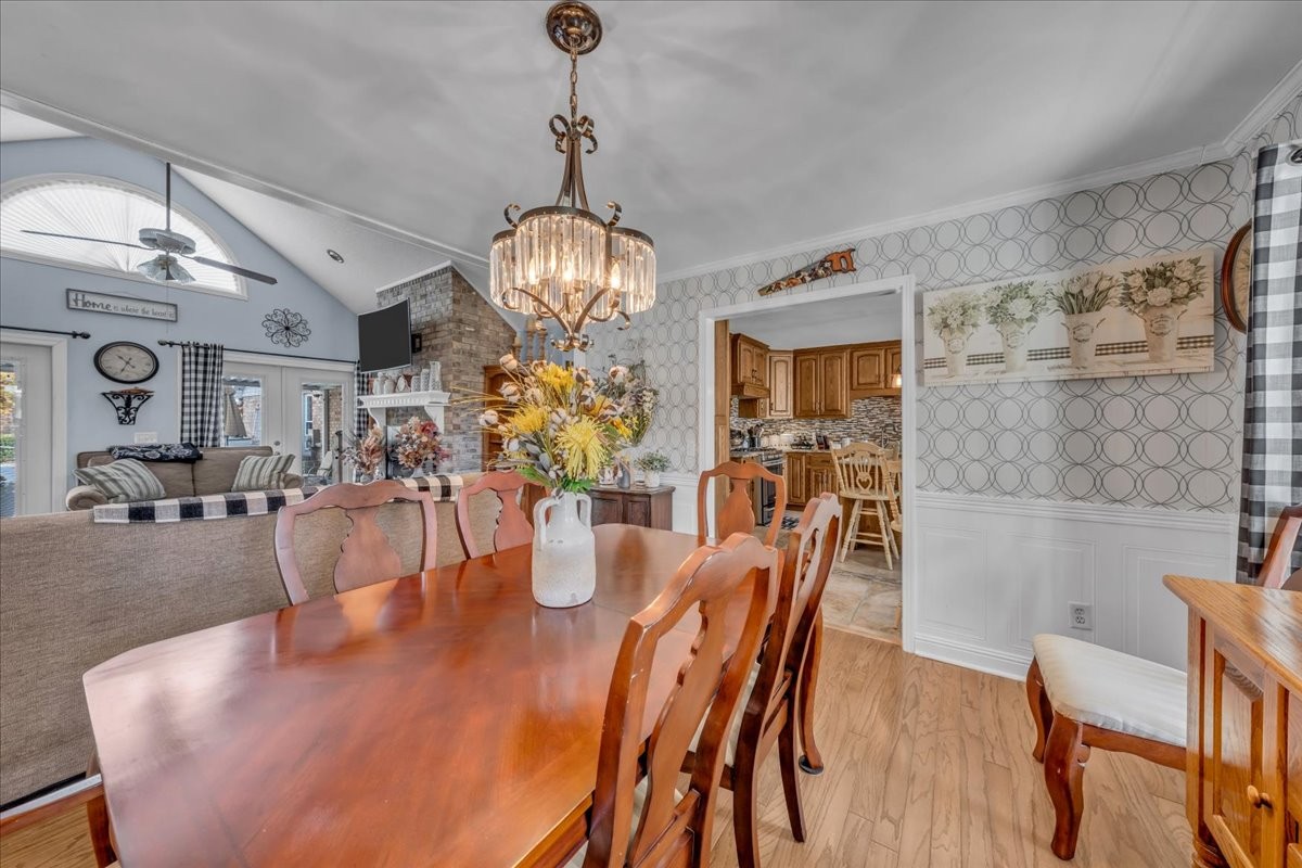 3404 Awalt Road Tullahoma, TN 37388 - Photo 19 of 84 a view of a dining room with furniture wooden floor and chandelier