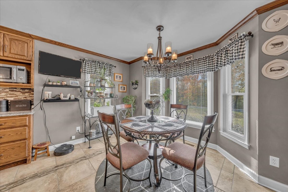 3404 Awalt Road Tullahoma, TN 37388 - Photo 28 of 84 a view of a dining room with furniture window and outside view