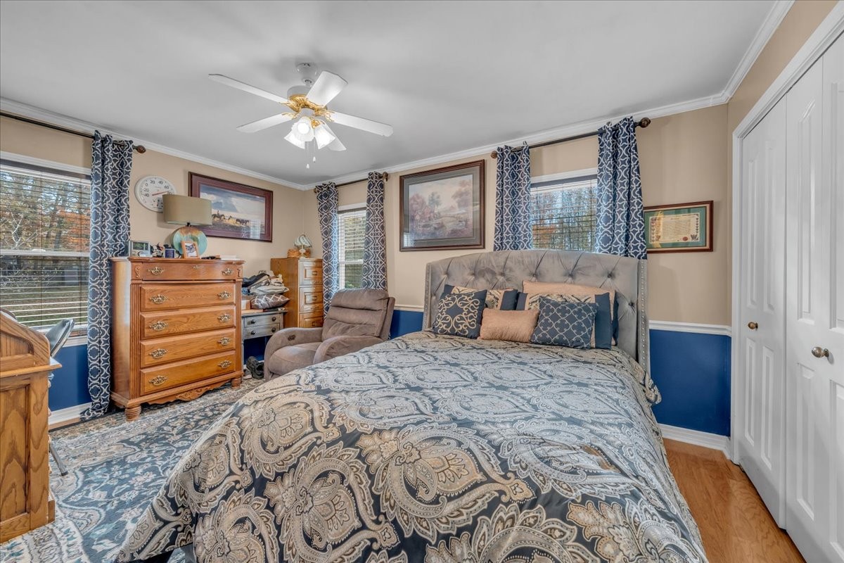 3404 Awalt Road Tullahoma, TN 37388 - Photo 38 of 84 a bed room with a bed and a television