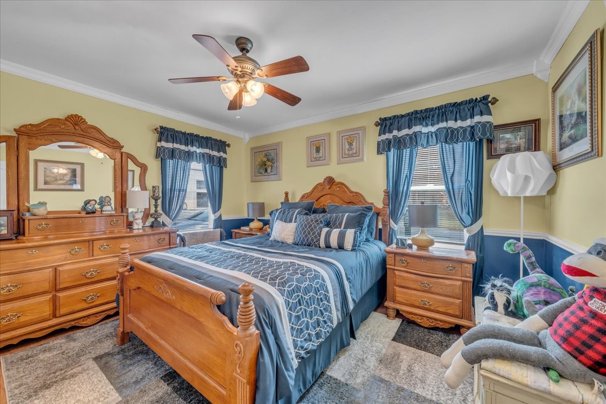 3404 Awalt Road Tullahoma, TN 37388 - Photo 40 of 84 a bedroom with a bed and wooden floor