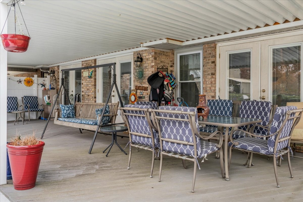 3404 Awalt Road Tullahoma, TN 37388 - Photo 48 of 84 a view of a dining room with furniture wooden floor and a chandelier