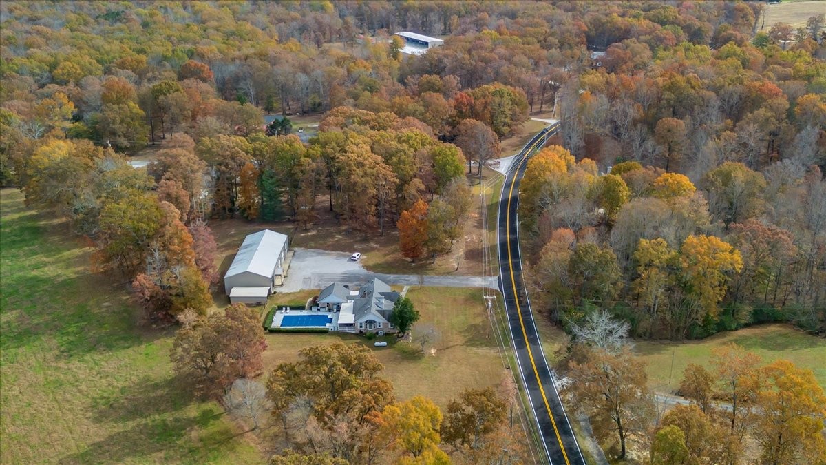 3404 Awalt Road Tullahoma, TN 37388 - Photo 71 of 84 a backyard of a house with a yard and mountain view