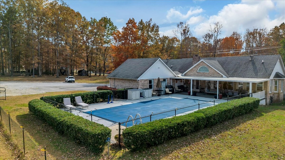 3404 Awalt Road Tullahoma, TN 37388 - Photo 74 of 84 an aerial view of a house with swimming pool and big yard