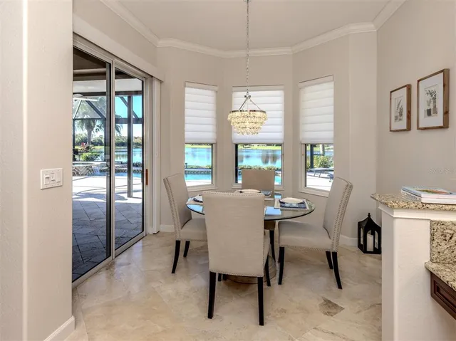 a kitchen with stainless steel appliances granite countertop sink stove and microwave