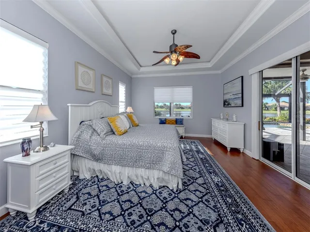 an aerial view of a house with yard swimming pool and outdoor seating