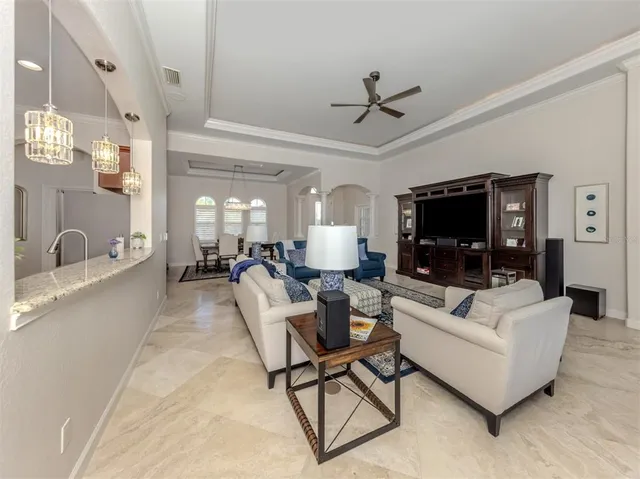 a view of a dining room with furniture window and outside view