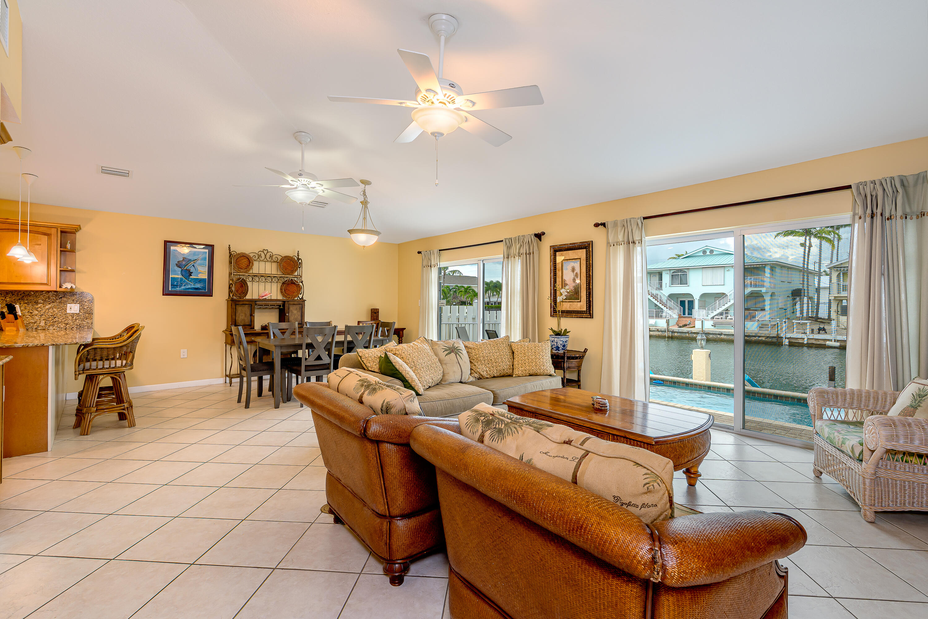 260 Sadowski Causeway Key Colony Beach, FL 33051 - Photo 25 of 50 a living room with furniture and a large window