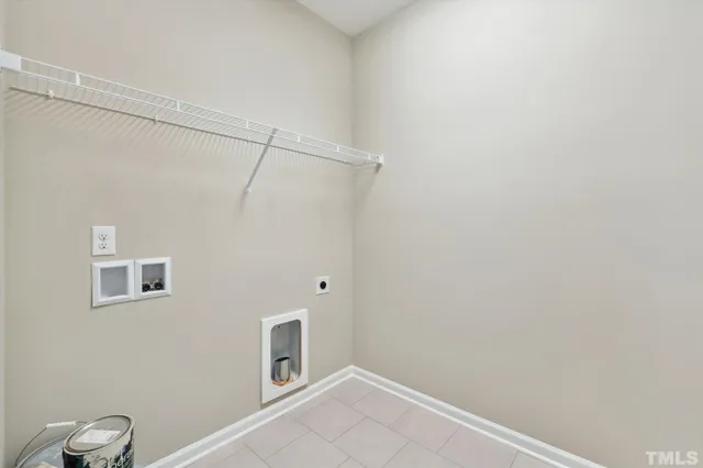 a view of front door of house with wooden floor
