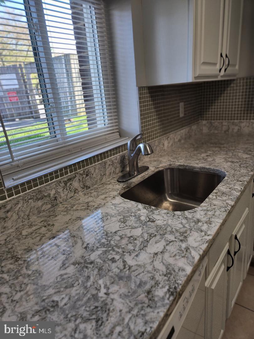 11911 Tarragon Road, Unit A Reisterstown, MD 21136 - Photo 5 of 12 New granite counters and backsplash