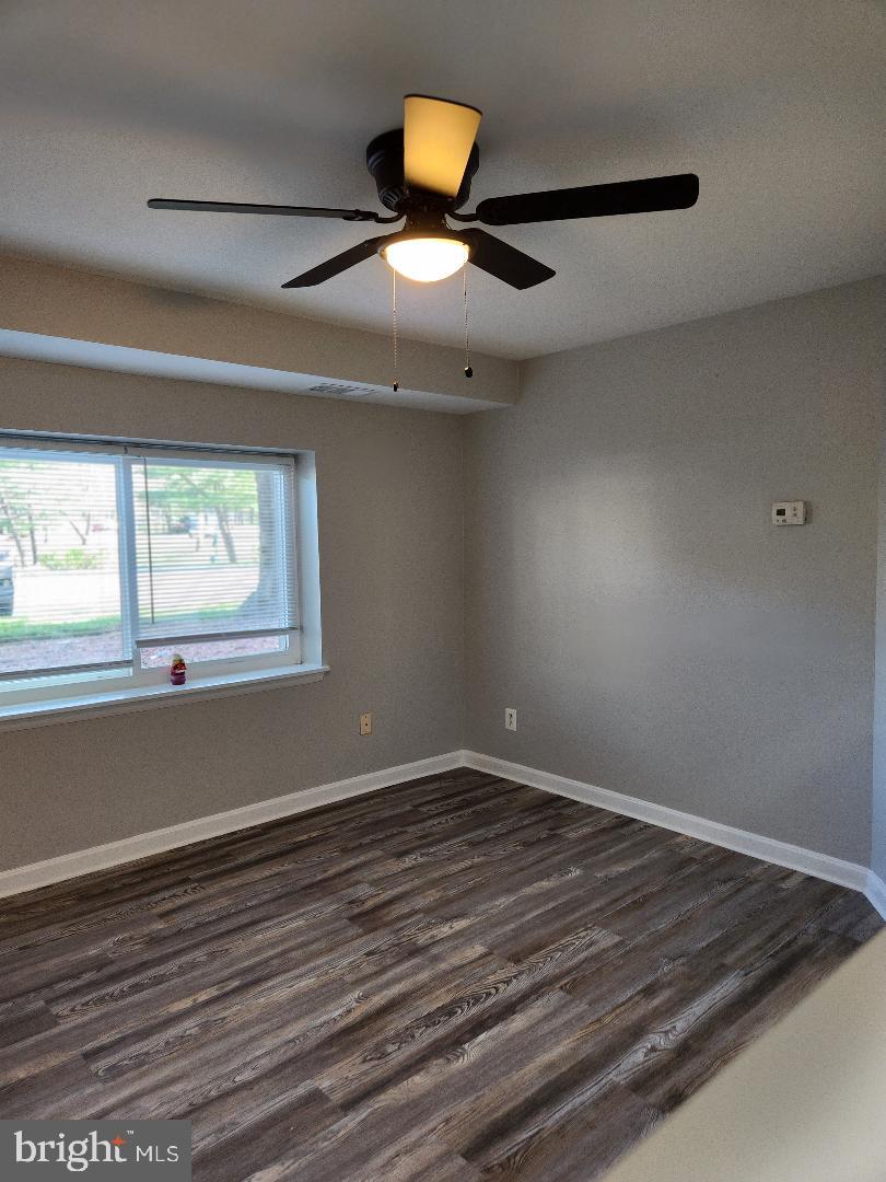 11911 Tarragon Road, Unit A Reisterstown, MD 21136 - Photo 7 of 12 Laminate floors in living room