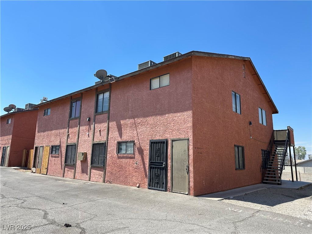 2305 Exeter Drive Las Vegas, NV 89156 - Photo 2 of 6 View of building exterior with stairs