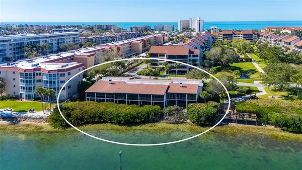 an aerial view of a house with a garden