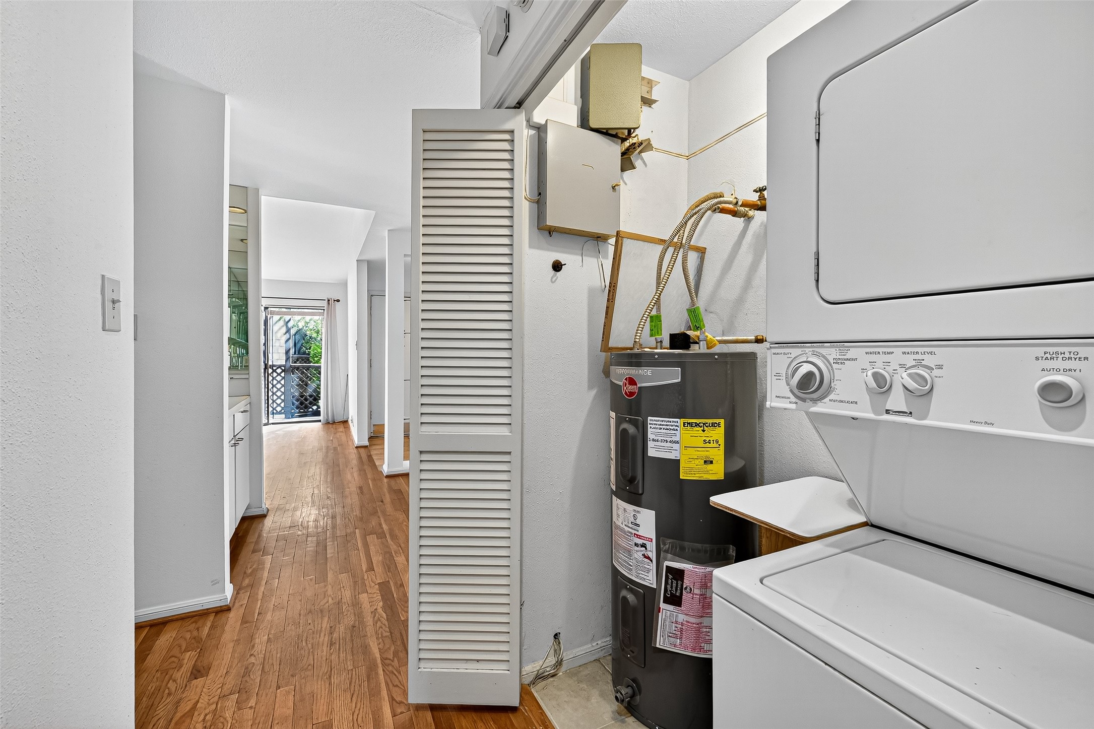 2829 Timmons Lane, Unit 176 Houston, TX 77027 - Photo 18 of 34 a view of hallway with wooden floor